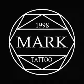 Mark Tatuaje y Piercing