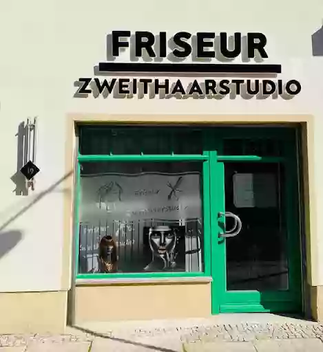 Friseur - und Zweithaarstudio Ertel