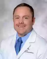 Travis Michael Hughes, MD