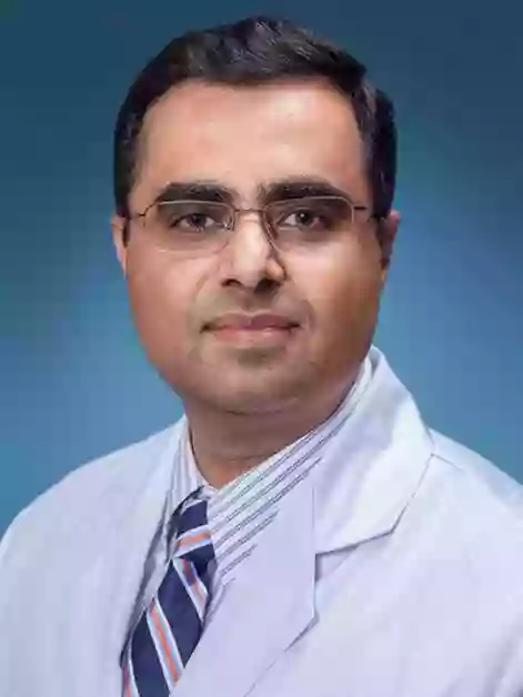 Anuj Mahindra, MD