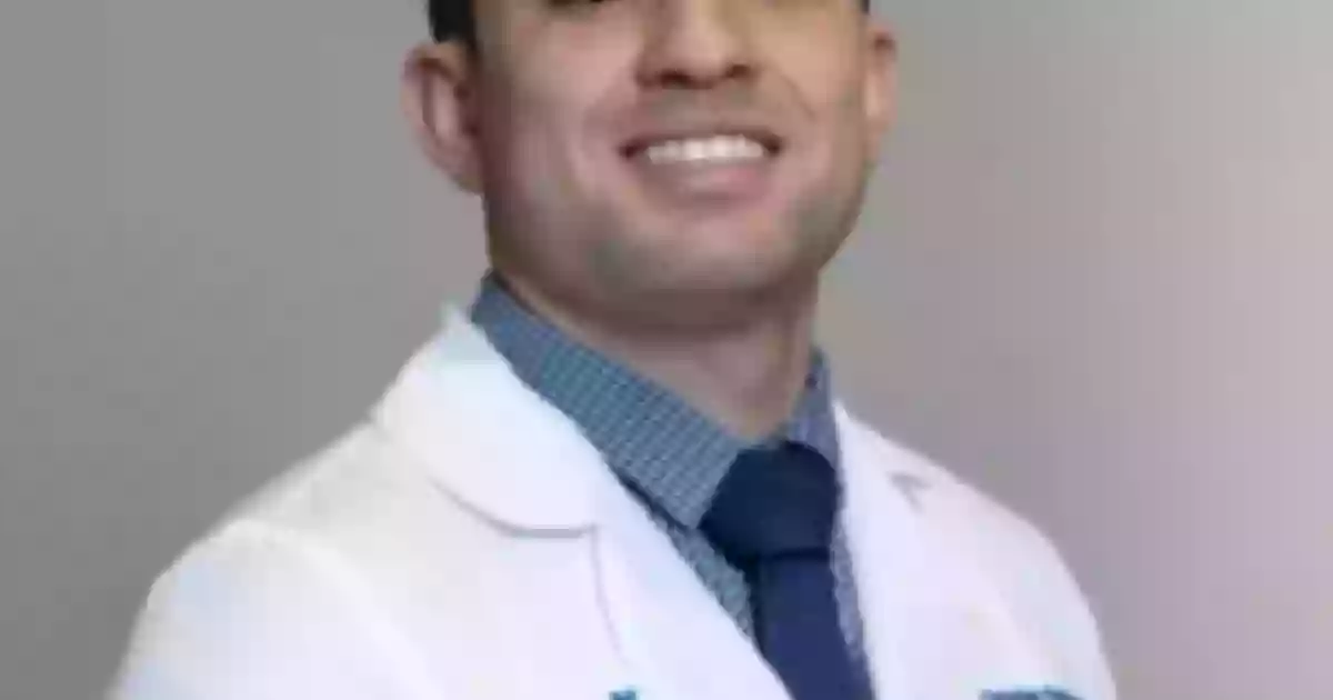 Christian Aguado, MD