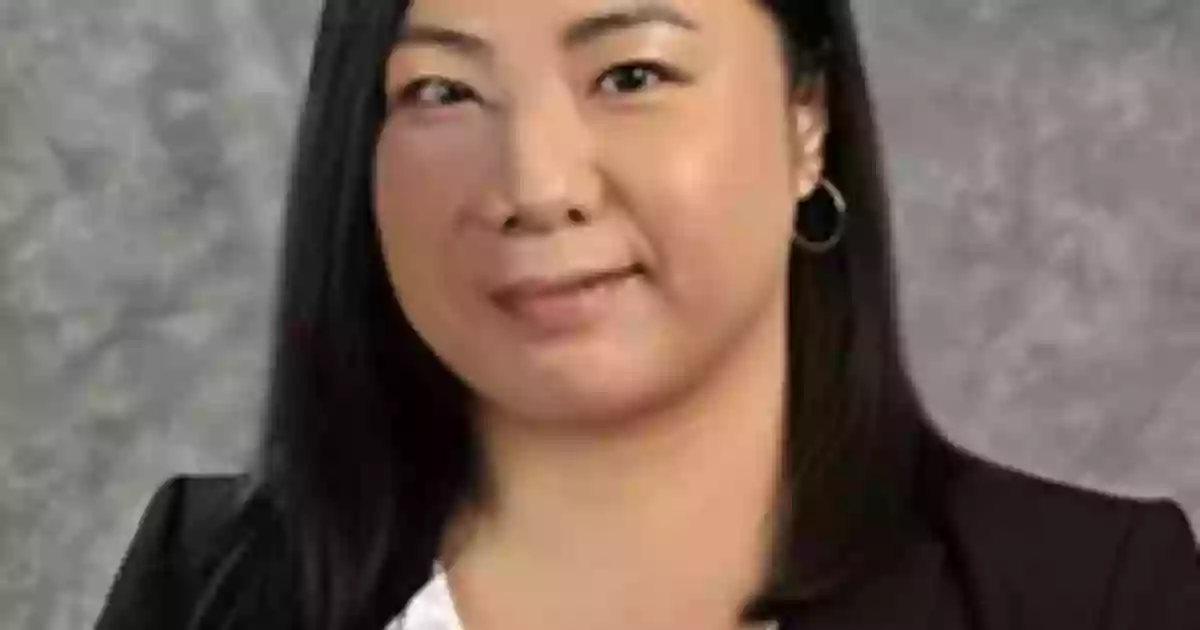 Xiao M. Huang, MD