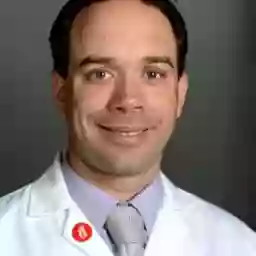 Corey Falcon, MD