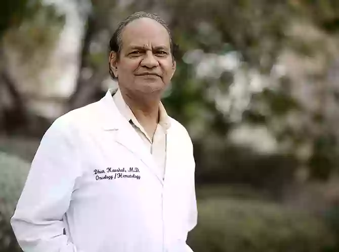 Dr. Dhan Kaushal