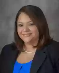 Dr. Gloria Canizales