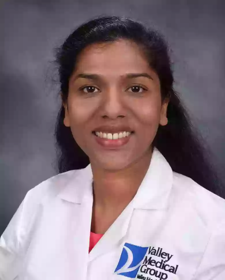 Asha John, MD