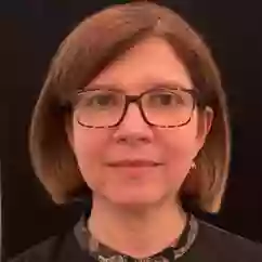 Dr. Oana Opariuc