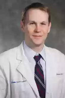 John H. Strickler, MD