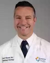 Dr. Greg Manson