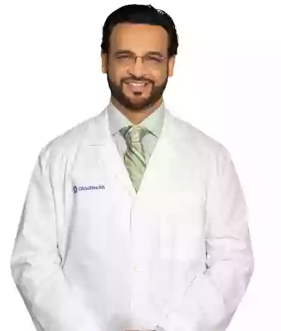 John A Sharma, MD