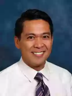 Dr. Raymond Cruz