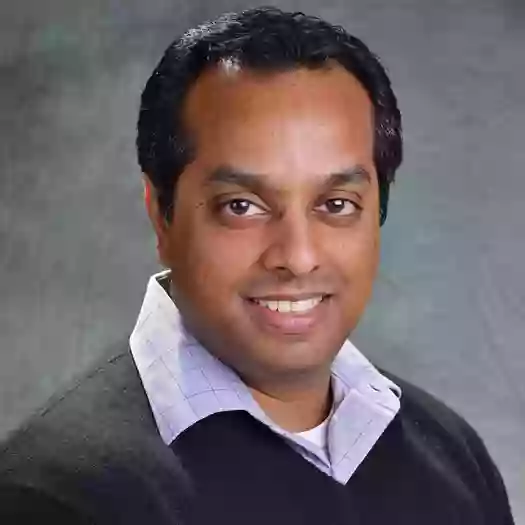 Dr. Dinesh Pillai